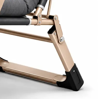Close-up of the champagne-coloured folding frame and recline mechanism